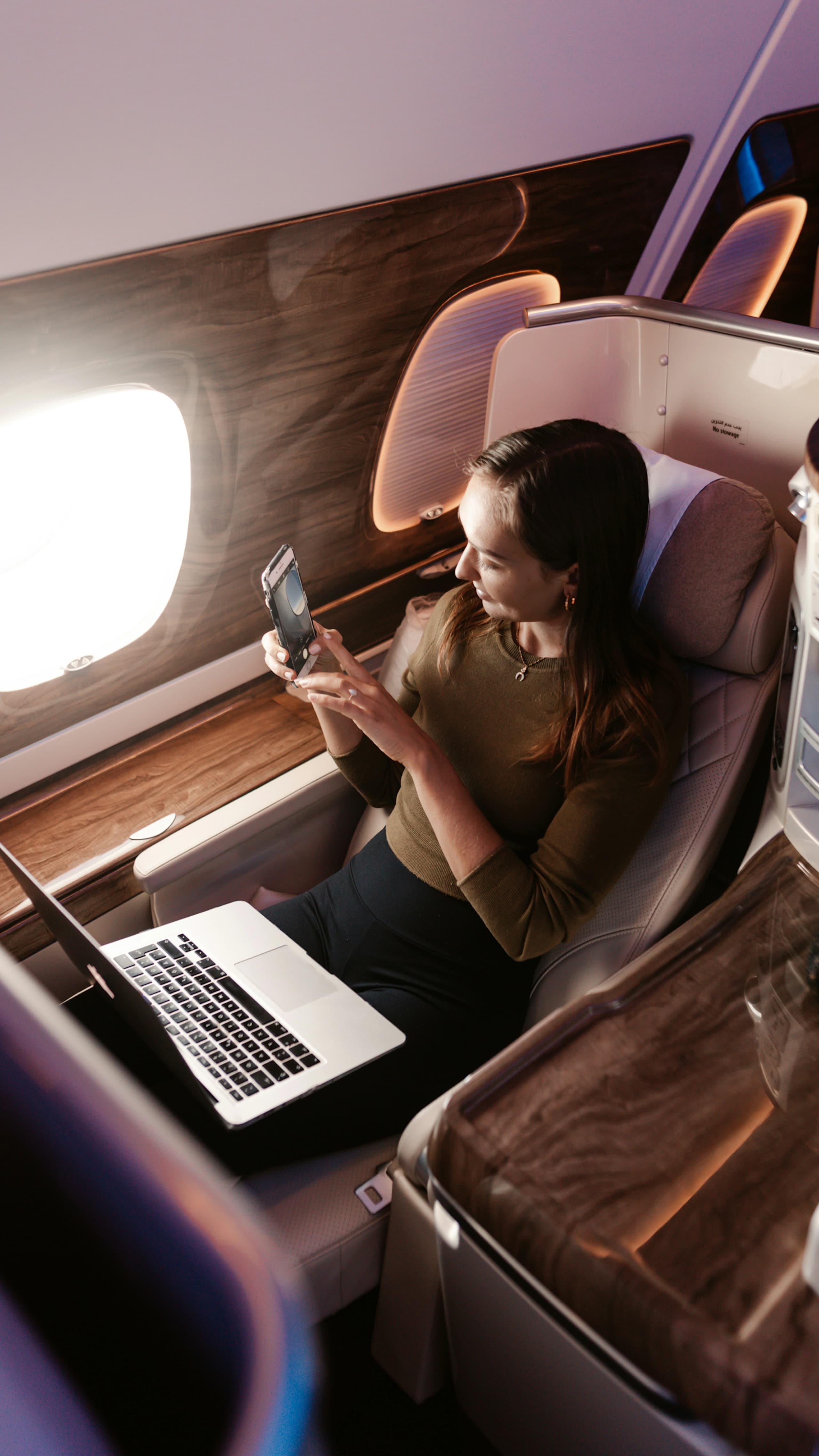 Man relaxing in luxurious private jet cabin
