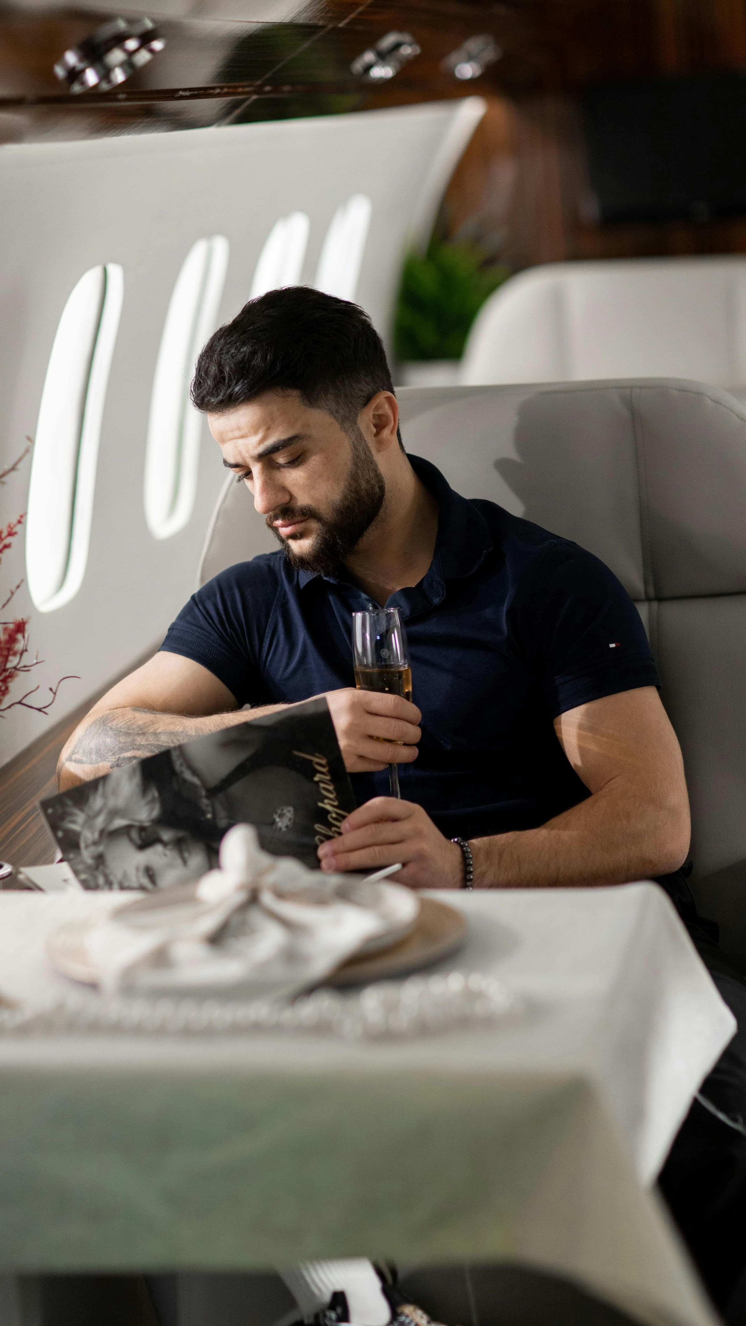 Man relaxing in luxurious private jet cabin